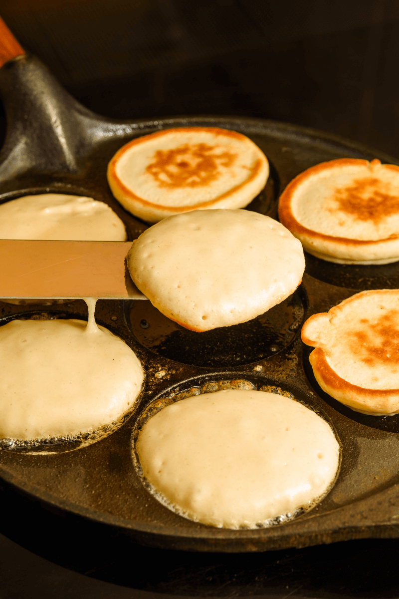 Homemade Vegan Pancakes Recipe: first flip. Nice crust on the pancakes. 